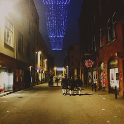 Buildings in city at night