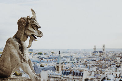 Statue of buildings in city