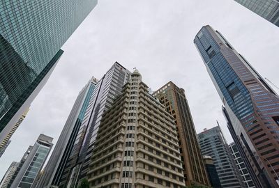 Low angle view of modern buildings against sky