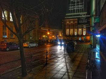 Cars on road at night