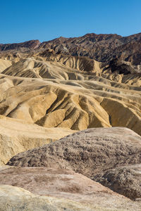 Scenic view of desert against clear sky