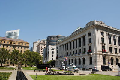 People in front of buildings