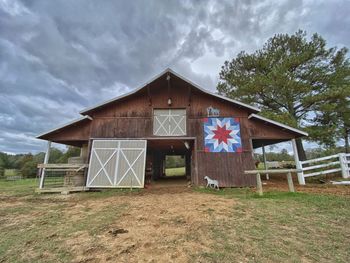 House on field against sky