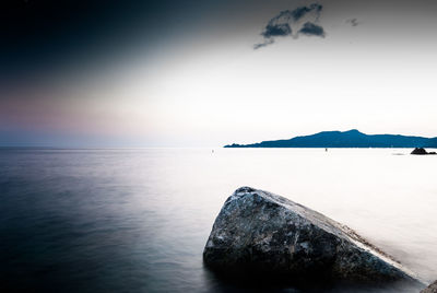 Scenic view of calm sea against sky