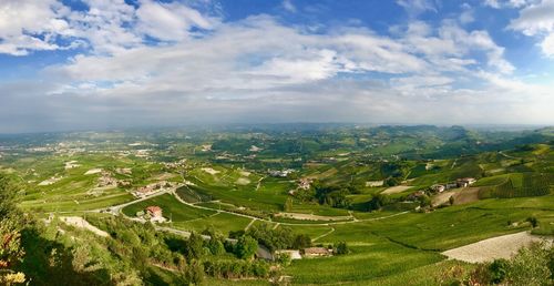 Aerial view of agricultural landscape against sky