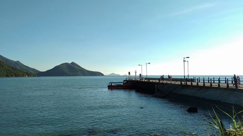 Scenic view of sea against clear blue sky