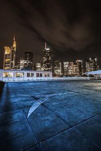 Illuminated buildings in city at night