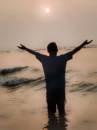 Scenic view of sea at sunset