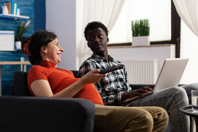 Couple sitting at home