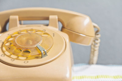 Close up of telephone on table