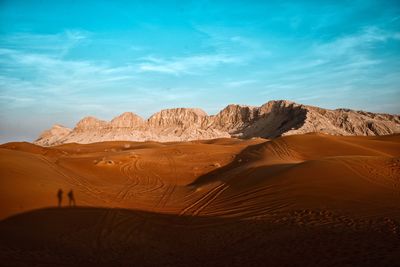 Scenic view of desert against sky