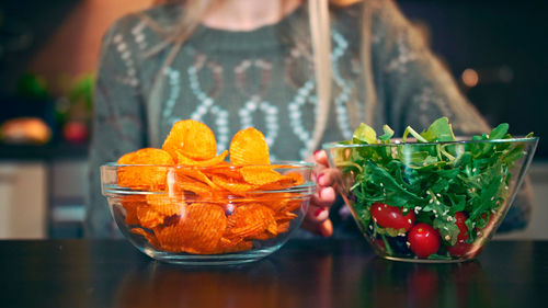 Midsection of woman having food