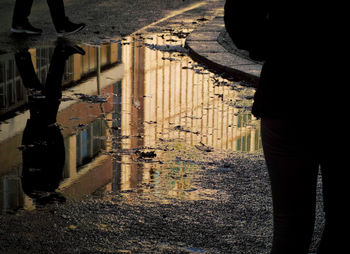 Shadow of man standing in row