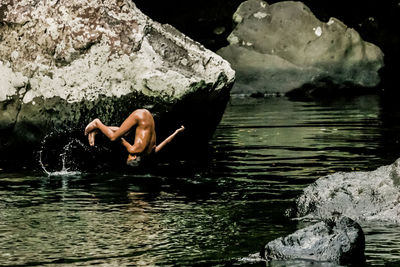 Man swimming in lake