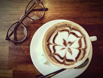 Close-up of coffee cup on table