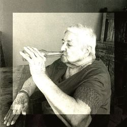 Portrait of man sitting at home