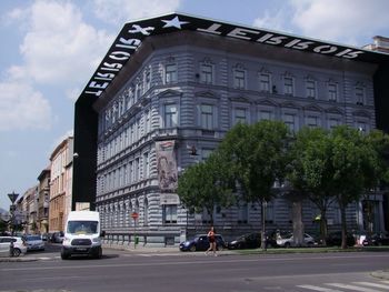 View of buildings in city against sky