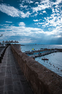 Pier over sea against sky