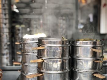 Close-up of stack of containers in market