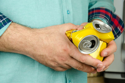 Close-up of man holding camera