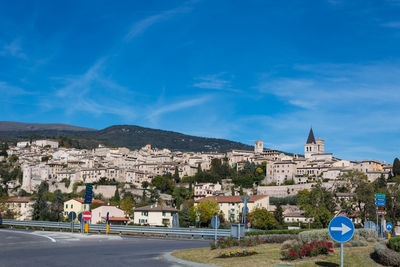 View of residential district against blue sky