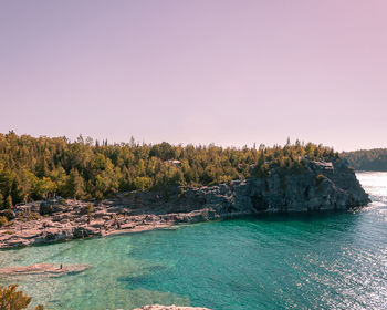 Scenic view of sea against clear sky