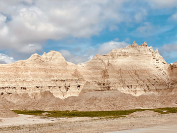 Scenic view of rocky mountains against sky
badlands south dakota