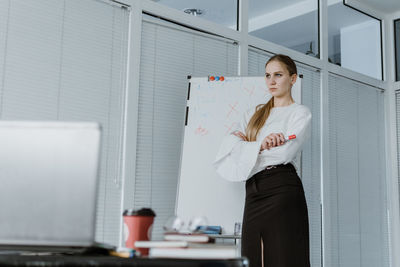 Young professionals, starting new job, beginning career. portrait of young confident business woman