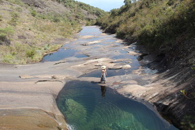 High angle view of people walking on mountain in cataratas national park