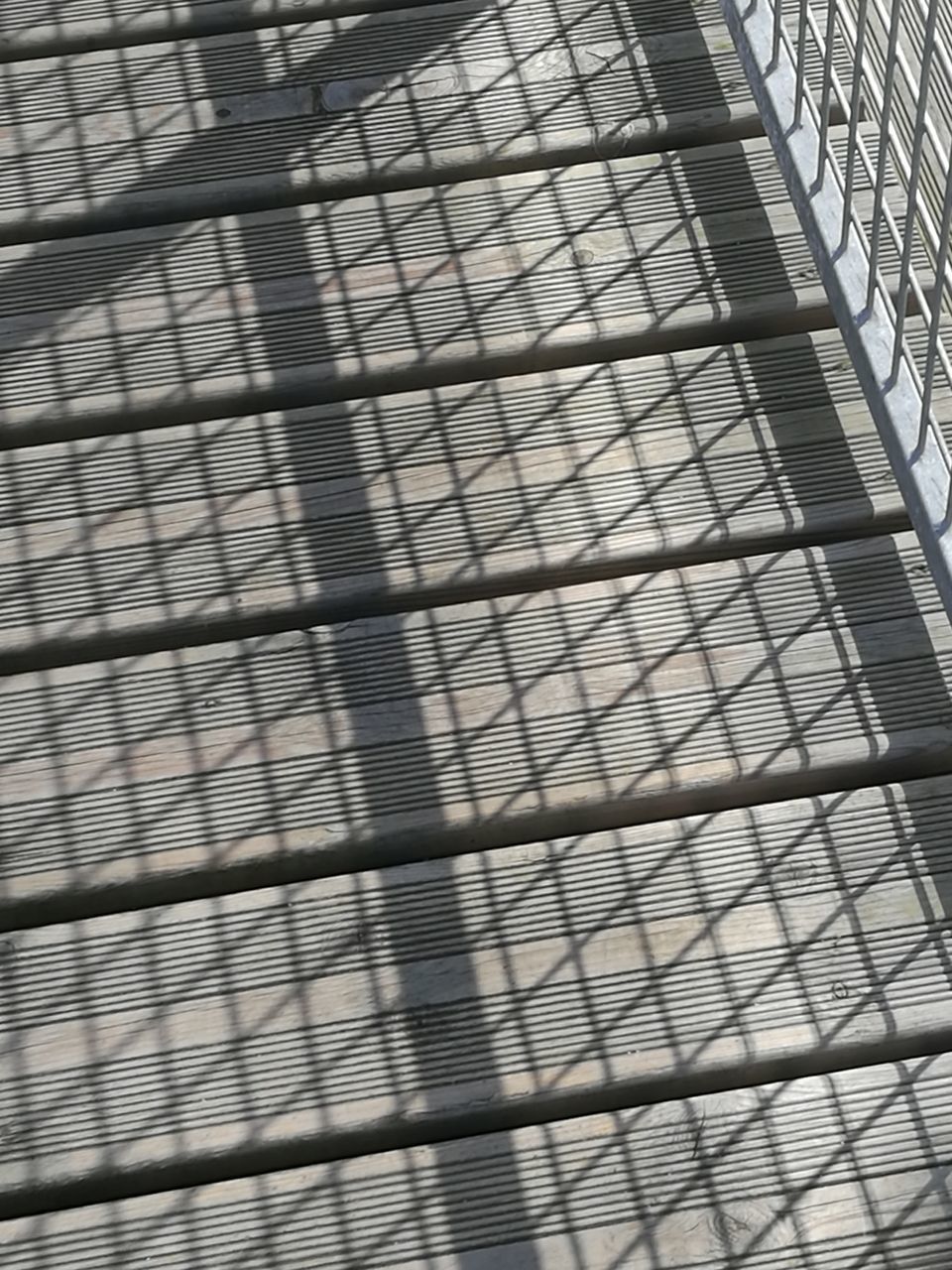 HIGH ANGLE VIEW OF METAL FENCE