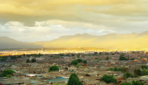 High angle view of townscape against sky during sunset