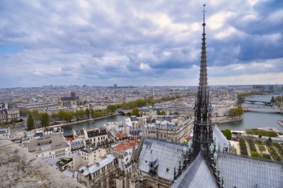 High angle view of city against cloudy sky