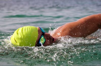 Man swimming in sea