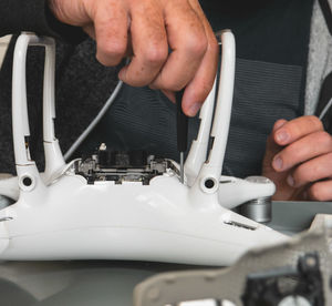 Close-up of person holding camera