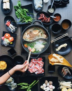 Directly above shot of man preparing food