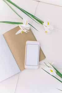 High angle view of white paper on table