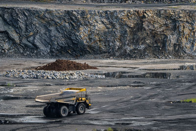 Dump truck in limestone mining, heavy machinery. mining in the quarry.