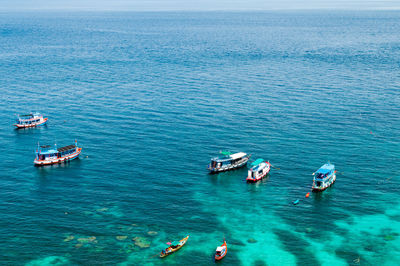 High angle view of people on sea