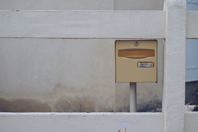 Close-up of mailbox on wall