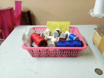 High angle view of candies in box on table