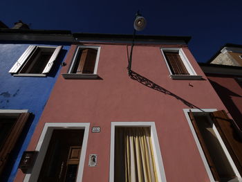 Low angle view of residential building against sky