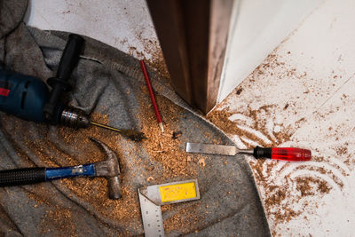 High angle view of work tools on floor