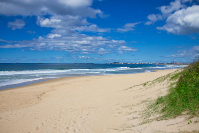 Scenic view of beach against sky