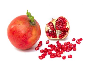 Close-up of fruits against white background