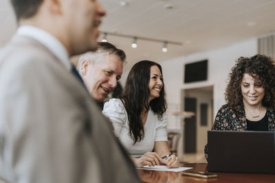 Smiling people during business meeting