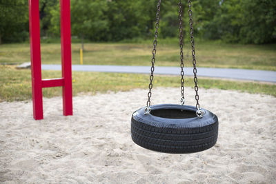 Empty swing in park