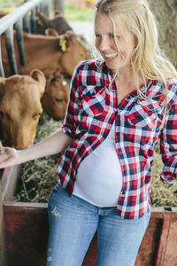 Pregnant woman on farm
