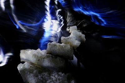 Close-up of ice cream over black background