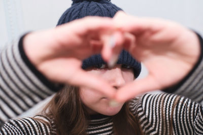 Close-up of woman holding hands