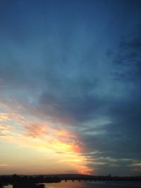 Scenic view of dramatic sky during sunset